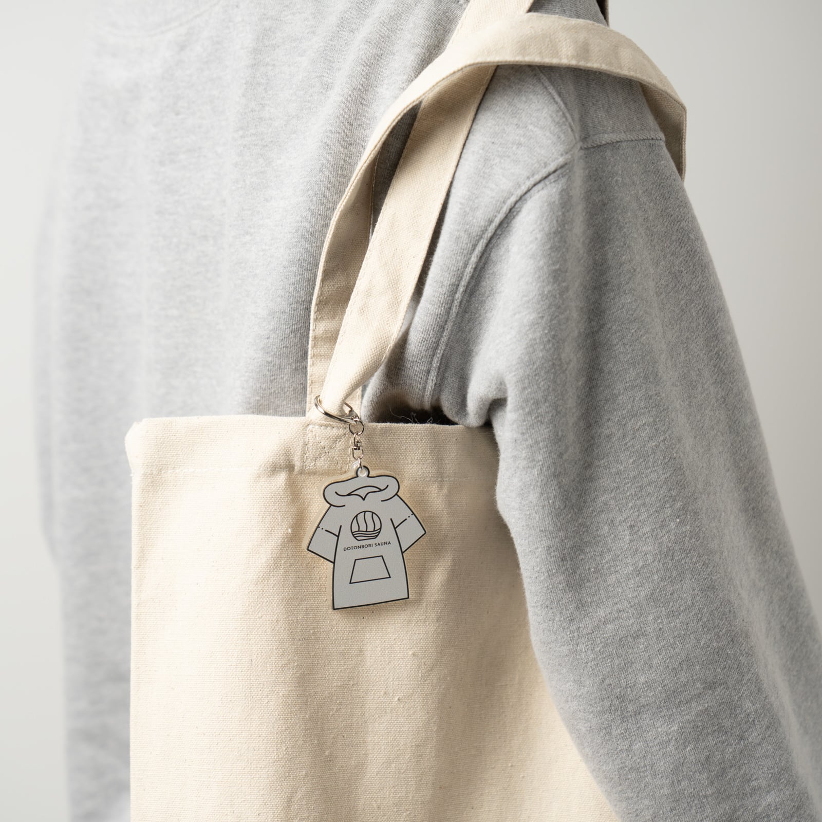 DOTONBORI SAUNA<br>ポンチョ アクリルキーホルダー