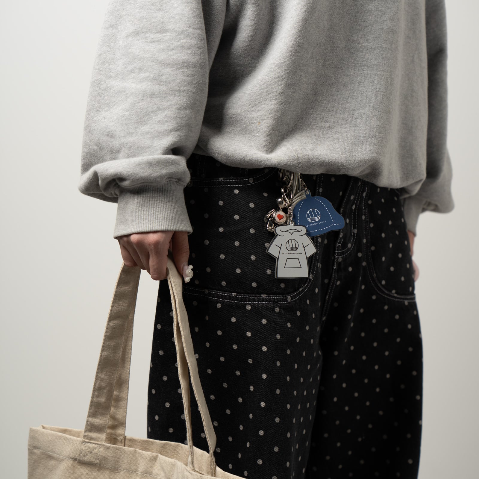 DOTONBORI SAUNA<br>ポンチョ アクリルキーホルダー